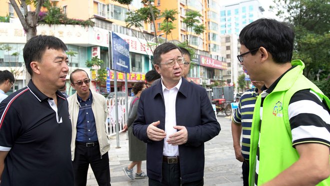 仔细询问创文情况